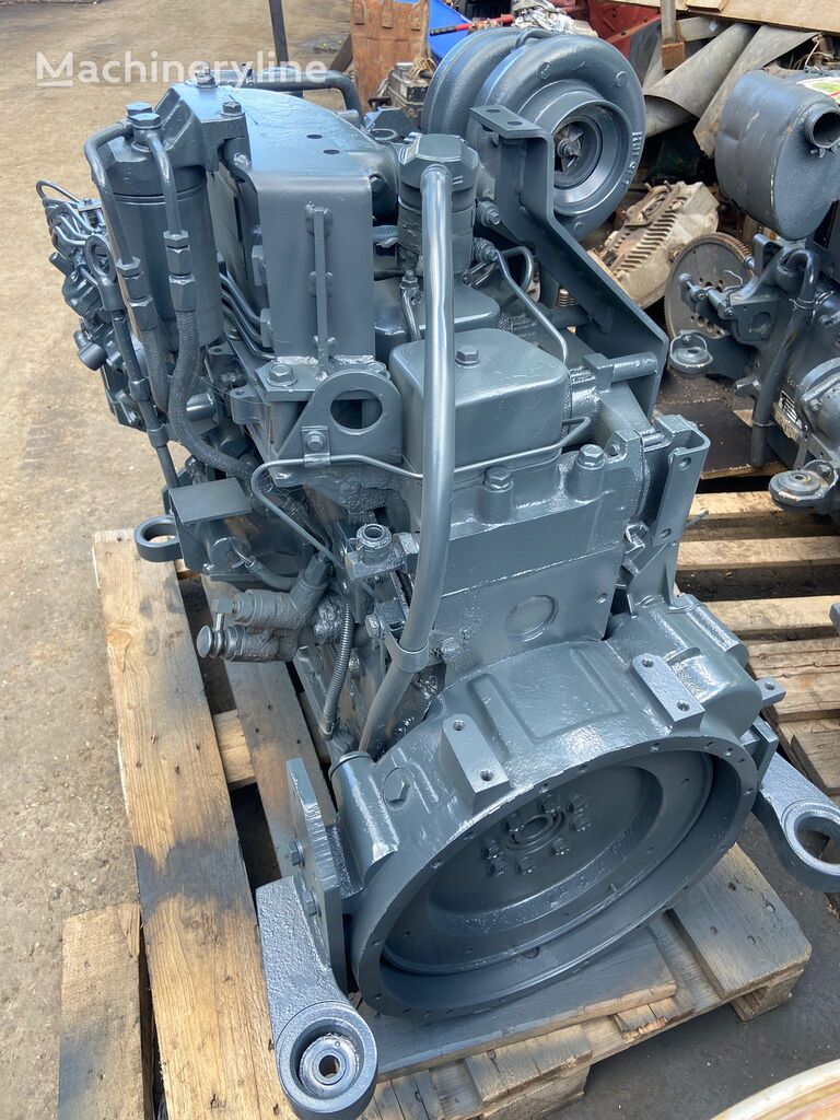 motor Komatsu SA6D102E pentru buldoexcavator