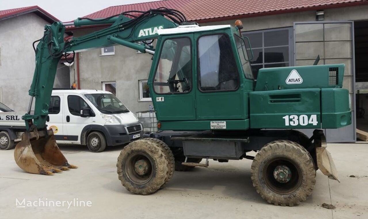 excavator pe roţi Atlas 1304