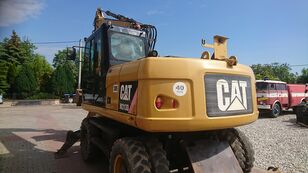 excavator pe roţi Caterpillar M313D