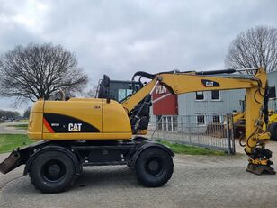 excavator pe roţi Caterpillar M313D