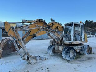 excavator pe roţi Liebherr A310